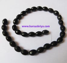 manik gelas oval hitam